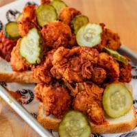 Cauliflower Florets · Fried cauliflower florets with your choice of heat level. Served with sliced white bread and...