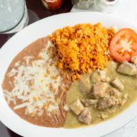 Chile Verde · Chunks of pork simmered in green housemade tomatillo sauce. Served with rice, beans, tortill...