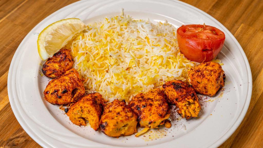 Chicken Kabob Plater · Boneless pieces of chicken thigh and breast marinated in special herbs and spices, broiled on a skewer.