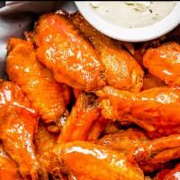 10 Pcs Buffalo Wings  · chicken wings with Buffalo wings and side of ranches.