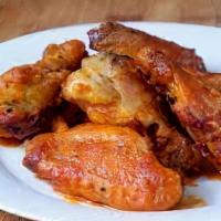 5 Buffalo Wings  · chicken Wings marinated with  original buffalo sauce and side of ranch.
