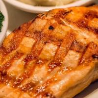 Grilled Salmon Filet · 8oz. filet, simply grilled with lemon and butter, garlic mashed potatoes and grilled asparag...
