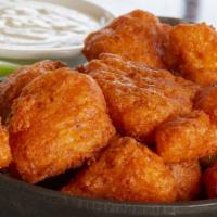 Buffalo Cauliflower · Lightly breaded, fried, tossed in buffalo sauce and ranch dressing.