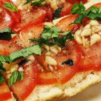 Bruschetta · Fresh tomatoes on baguette bread.