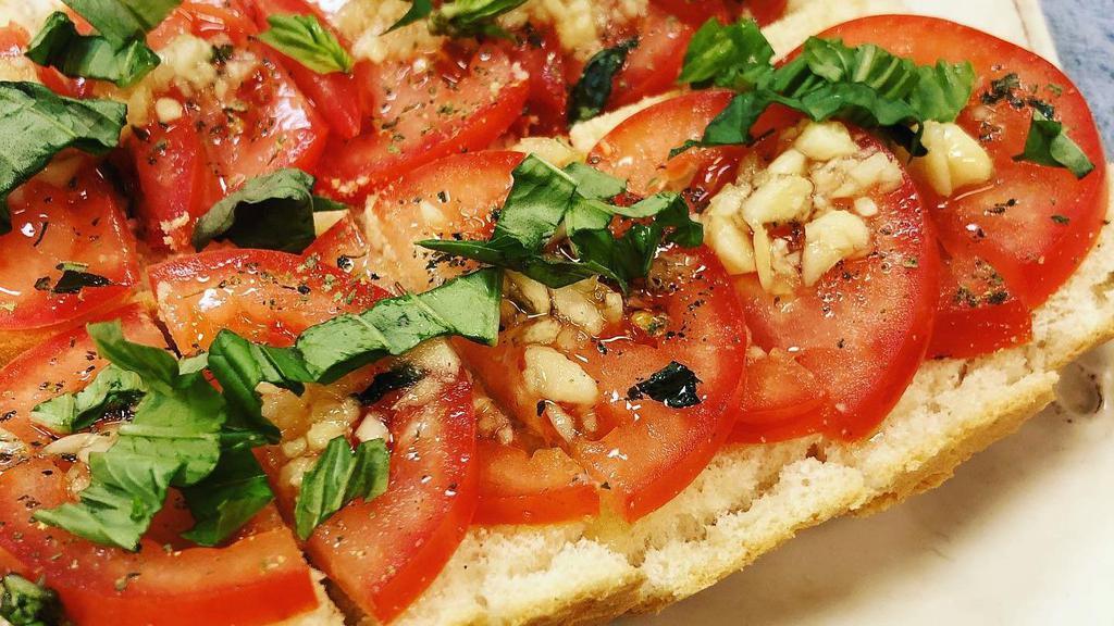 Bruschetta · Fresh tomatoes on baguette bread.