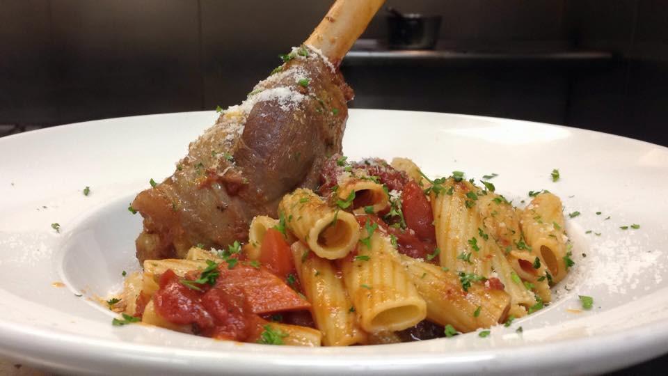 Lamb Shank · Cooked in a Maraqua sauce (tomatoes, carrots, celery, and onions) for several hours and served with Rigatoni pasta.