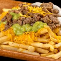 Carne Asada Fries · French fries topped with carne asada, sour cream, guacamole, and cheese.
