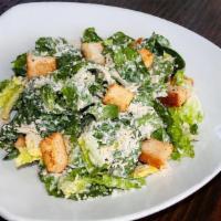 Chicken Caesar · romaine lettuce | shredded parmesan cheese | oven-baked crisp croutons | caesar dressing