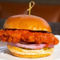 Buffalo Chicken Sandwich · brioche bun | crispy buttermilk fried chicken breast tossed in wing sauce | pickles | red on...