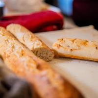 Baked Baguette · A fully baked sourdough baguette! Enjoy the warm soft freshness right out the oven!
