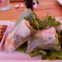 Spring Roll · Chicken and shrimp fresh roll served with sweet and sour peanut sauce. lettuce, cucumber, ca...
