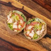 Chicken Caesar Wrap · Homemade chopped chicken breast & shaved parmesan with romaine lettuce, tomato & Caesar dres...