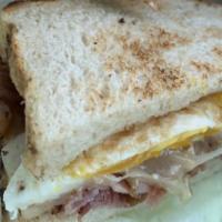 Breakfast Sandwich · Favorite. Ham, bacon, egg & choice of cheese/bread.