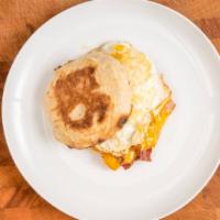 Ham & Scram Muffin · Ham, bacon, egg & choice of cheese on toasted English muffin.