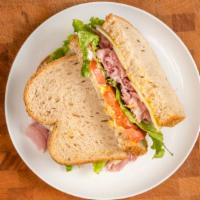 Smoked Ham Sandwich · Thin sliced smoked Ham, fresh lettuce, ripe tomato, mustard & mayo.