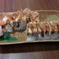 Awesome Roll · Shrimp tempura, imitation crab, & avocado roll topped w/ salmon, eel sauce, & dynamite sauce...