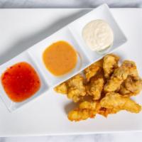 Chicken Tempura · Eight pieces of Japanese style chicken tempura with crispy batter and our homemade sauce.