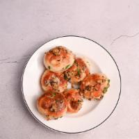 Garlic Knots (6) · Homemade dough twisted into knots, tossed with oil and garlic.