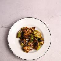 Roasted Brussel Sprouts · Tender brussels, crisp bacon, balsamic reduction.