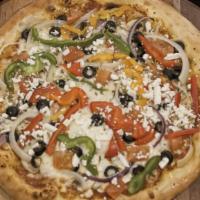 Vegeterian · mozzarella, tomato sauce, black olives, onions, tomatoes,
mushroom, feta cheese, oregano, be...