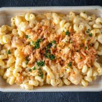 Lobster Mac · Cavatappi Pasta Tossed with a Bechamel Sauce, our 5 Cheese Blend and garnished with Parsley.