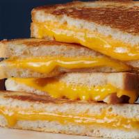 Classic Grilled Cheese · White toasted bread, American cheese.