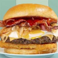 Meat Lovers Breakfast Burger · Eggs with beef burger, crispy bacon, caramelized onions, melted cheese, and hash brown.