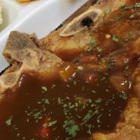 Pork Chop Smothered Or Fried (Meal)  · The Pork Chop can be fried or smothered and it comes with your choice of 2 Sides - [Mac & Ch...