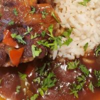 Oxtail Over Rice With 2 Sides/Cornbread  · This come with variety of sides to chose 2 from.