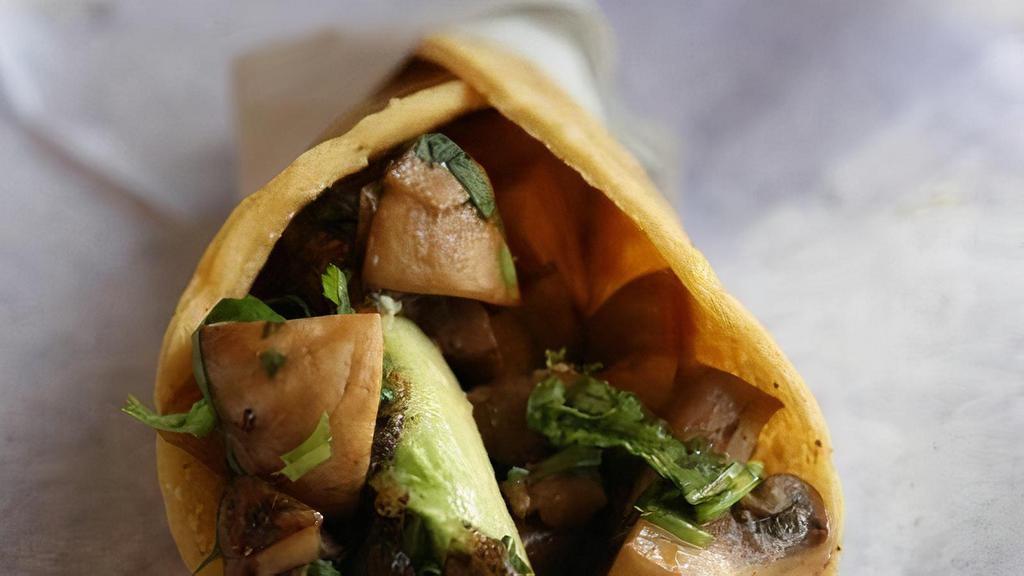 Mushroom Taco · SUATEED MUSHROOMS WITH GRILLED ONIONS, AVOCADO, SALSA MILD