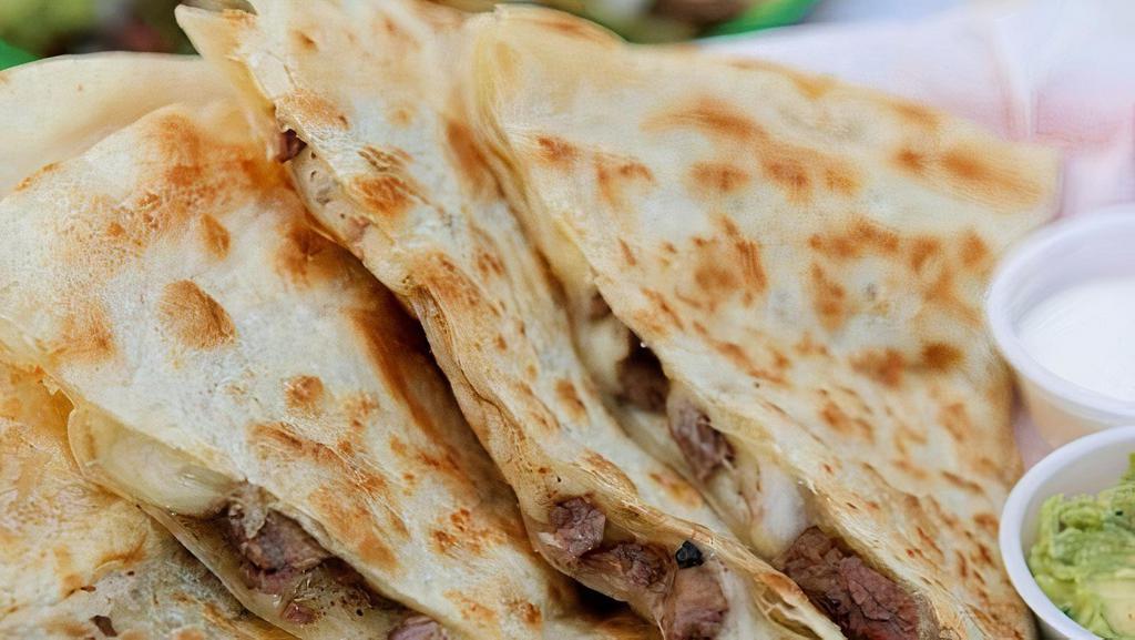 Carne Asada Quesadilla · ON FLOUR TORTILLA WITH GRILLED ANGUS STEAK AND SIDES OF GUACAMOLE, SOUR CREAM, AND PICO DE GALLO