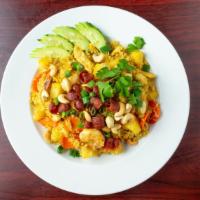 Pineapple Fried Rice · Fried rice with egg, shrimp, chicken, cashew nut, green onion, pineapple chunks, carrot, and...