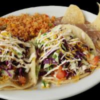Baja Fish Taco Plate. · Two Baja fish tacos, your choice of two sides.