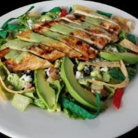Cilantro Lime Salad. · Romaine lettuce, avocado, cheese, corn, tomato, black beans, tortilla strips, with our cilan...