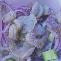Aguachile · Shrimp, cucumber, onion, red or green sauce, avocado, tostadas.