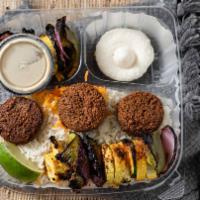 Falafel Veggie Plate · Gluten free.  Vegetarian. Served with rice, salad, grilled veggies and choice of sides. Vege...
