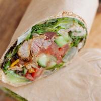 Filet Mignon Wrap · Wrapped with lettuce, cucumbers, tomatoes, pickles,
hummus spread, tahini and garlic sauce.