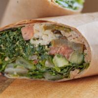 Hummus Veggie Wrap · Vegetarian. Wrapped with lettuce, cucumbers, tomatoes, pickles,
tabouleh, hummus , dolma, tz...