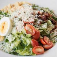 California Caesar Salad · romaine, cherry tomatoes, cherrywood bacon, hard boiled eggs, parmesan, avocado, croutons, c...