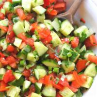 Shirazi Salad · Gluten free. Vegetarian. Chopped cucumbers, tomatoes and our house vinaigrette dressing. Glu...