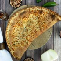I Love Mexican Pizza · Homemade beans sauce, mozzarella cheese, bacon, soy chorizo, onions, and jalapeños made of o...