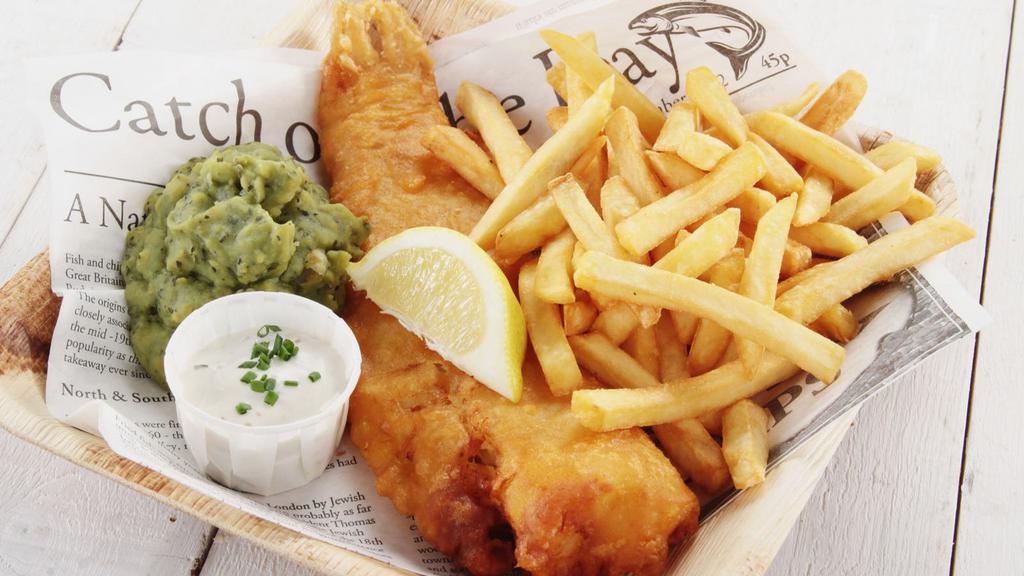 Fish And Chips · Beer battered Atlantic cod fish, served with fresh batch of french fries and a side of tartar sauce.
