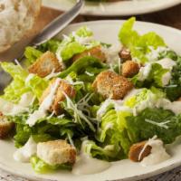 Caesar Salad · Fresh salad made with romaine lettuce, croutons, tomatoes, parmesan cheese, and a Caesar dre...