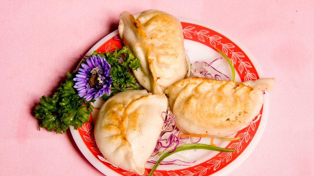 Pot Stickers · Chicken & veggie dumpling (lightly pan-fried)