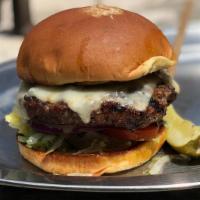 Cajun Burger · Seared and blackened in Cajun spices and served with chipotle mayo, pepper jack cheese, lett...