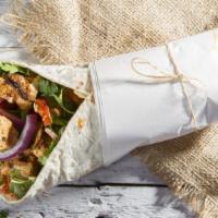 Chicken Kebab Wrap · Juicy chicken kebabs, lettuce, tomatoes, garlic sauce, and house dressing wrapped in a warm ...