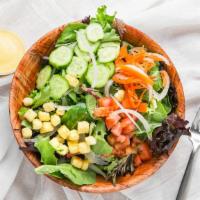 House Salad · Mixed greens, chopped tomatoes, shredded carrots, cucumber, and croutons.