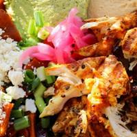 Chicken Bowl (Iconic Bowls) · Grilled chicken, salad, green onions, basmati rice, hummus, pickles, croutons, garlic sauce
