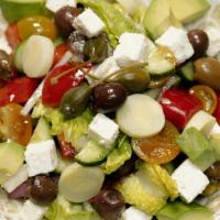 Greek Hearts Of Palm & Feta Salad · Crispy gem, ripe tomato, pepper, cucumber, snap pea, kalamata olives, red onions, lemon vina...