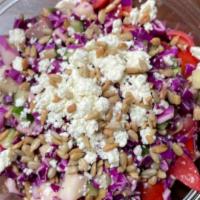 Mediterranean Chopped Salad  · Red cabbage, cucumber, cherry tomato, green apple, jalapeño, olives, red onions, sunflower s...